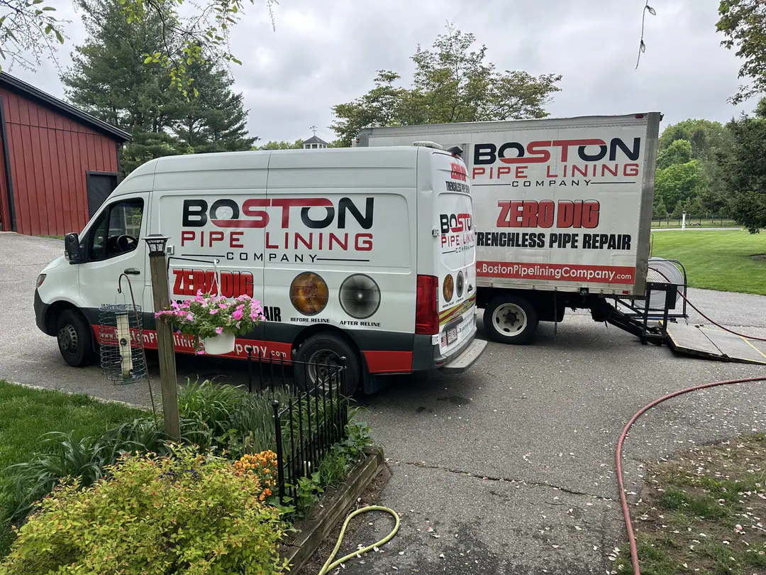 Boston Pipelining van and box truck at a work site