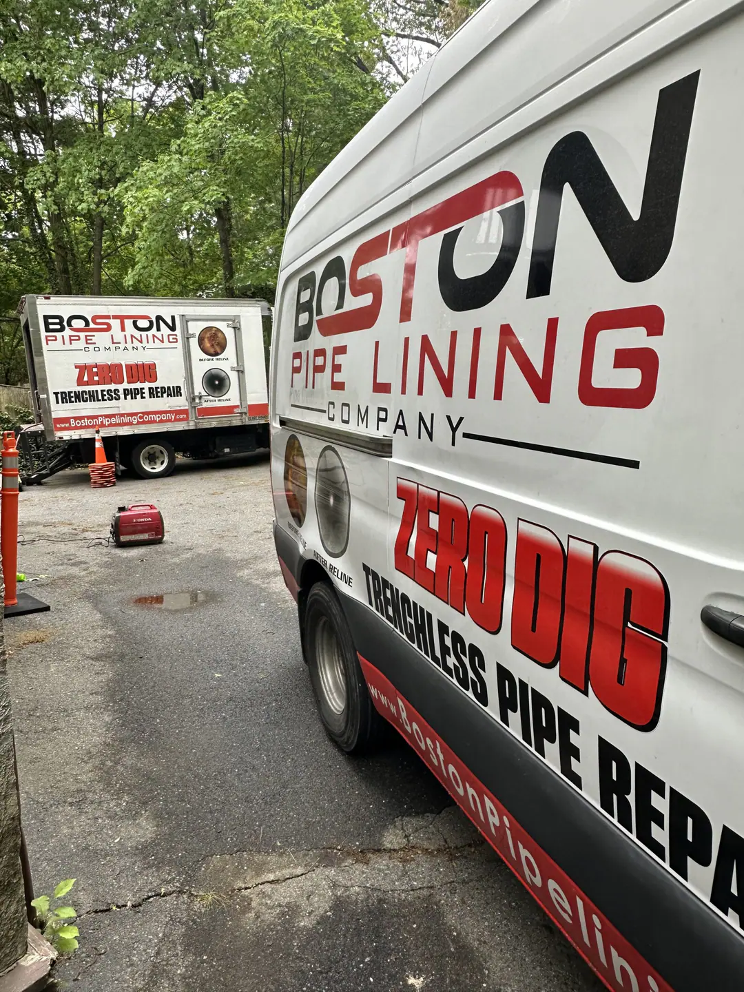 Boston Pipelining van and box truck with lining equipment on site