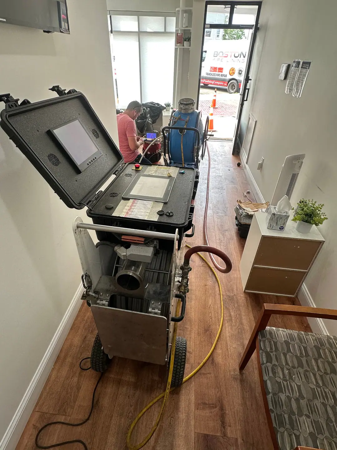 Our lining control equipment set up in a finished hallway on our Jamaica Plain job