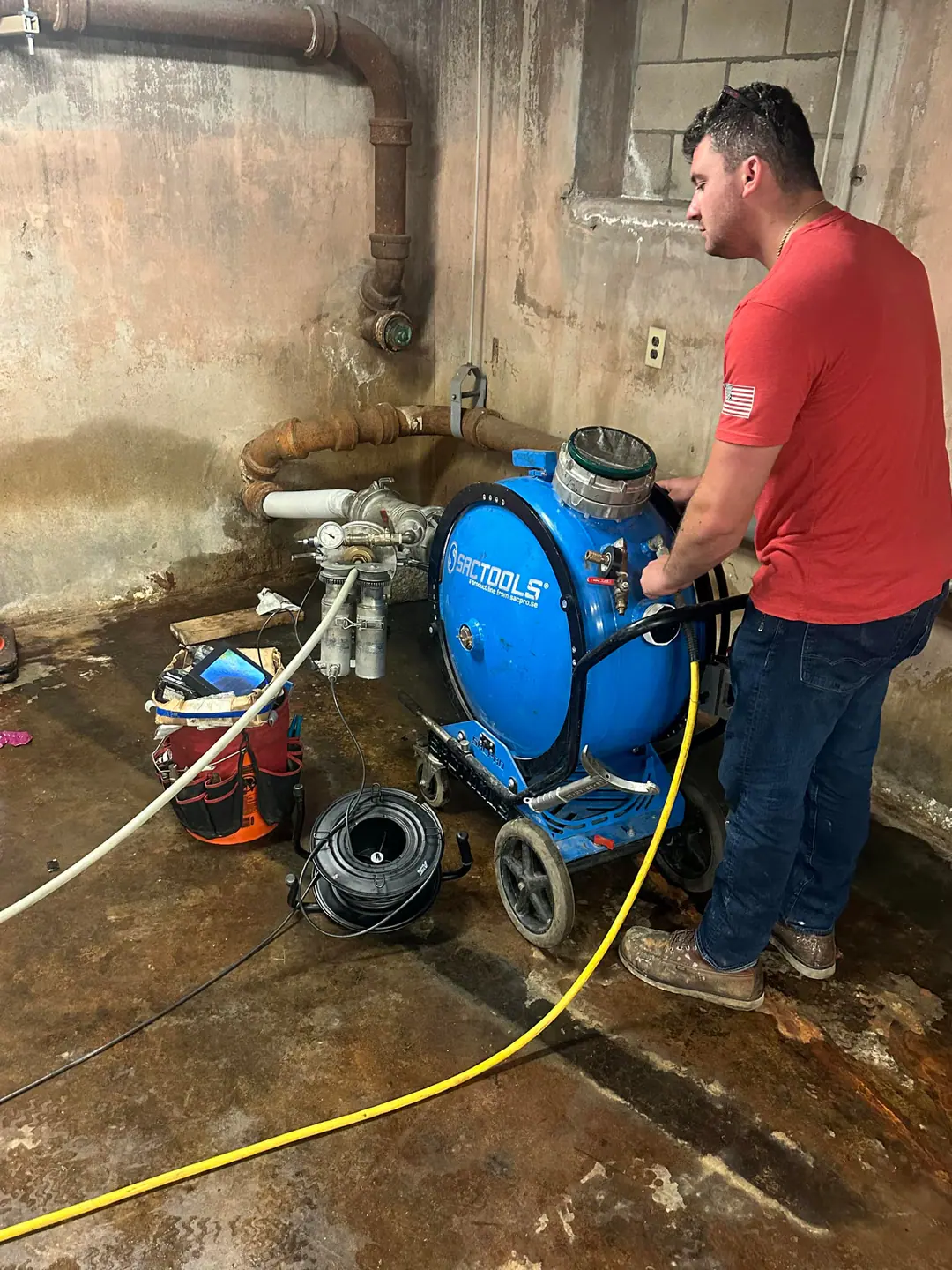 Our technician running the inversion drum in a basement on our South Boston job