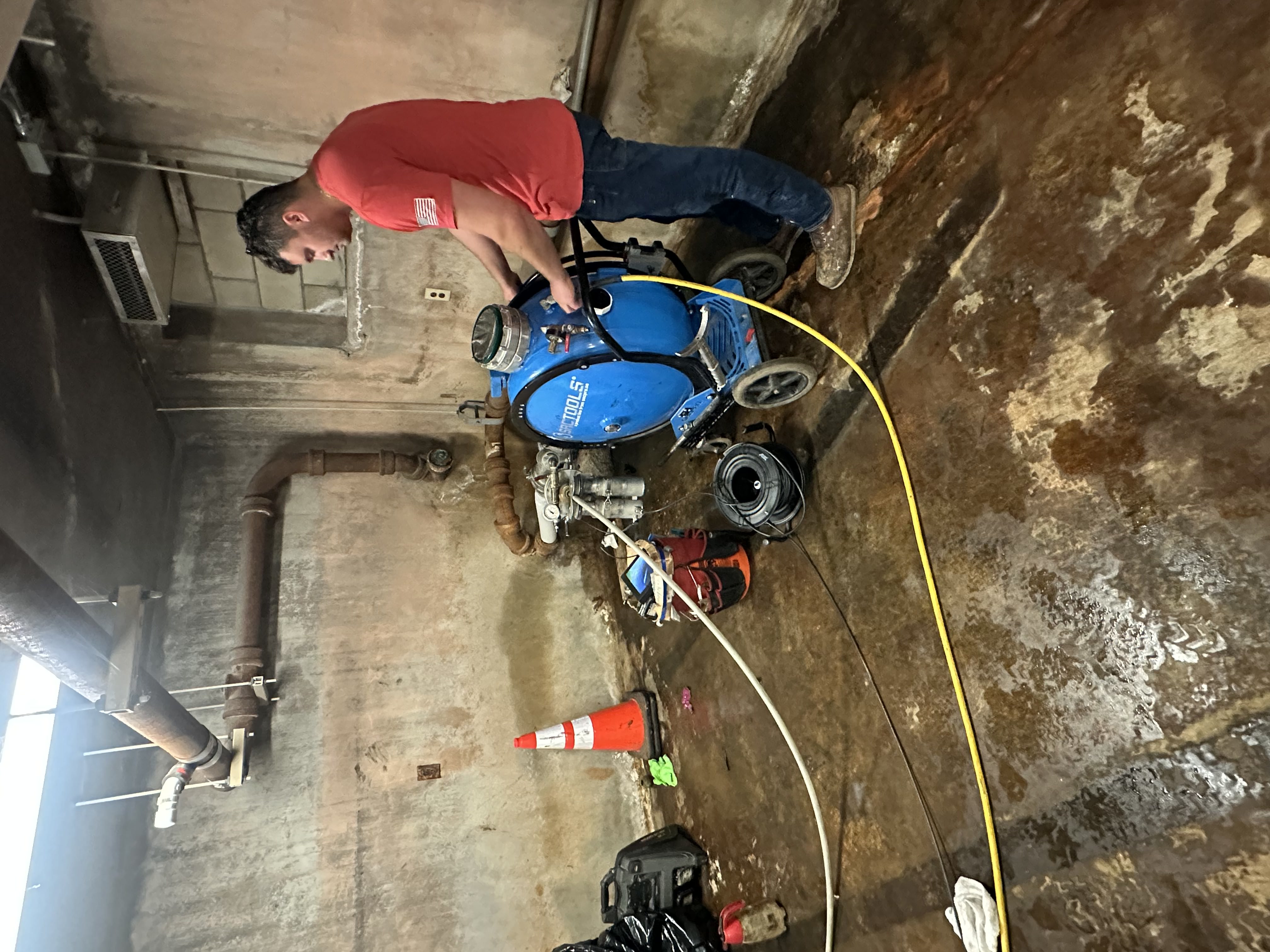 Boston Pipelining Company performing trenchless sewer lining in South Boston basement